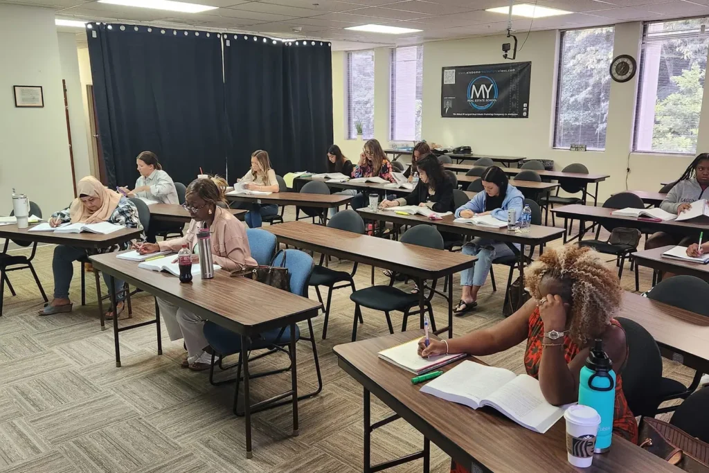 Students working through the pre-license course in the classroom